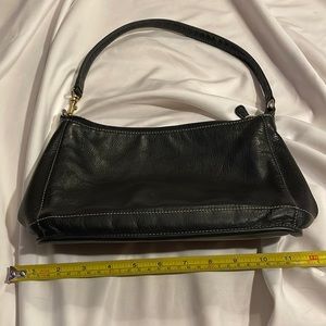 ILI small black shoulder purse approximately 10x7x3 inches.